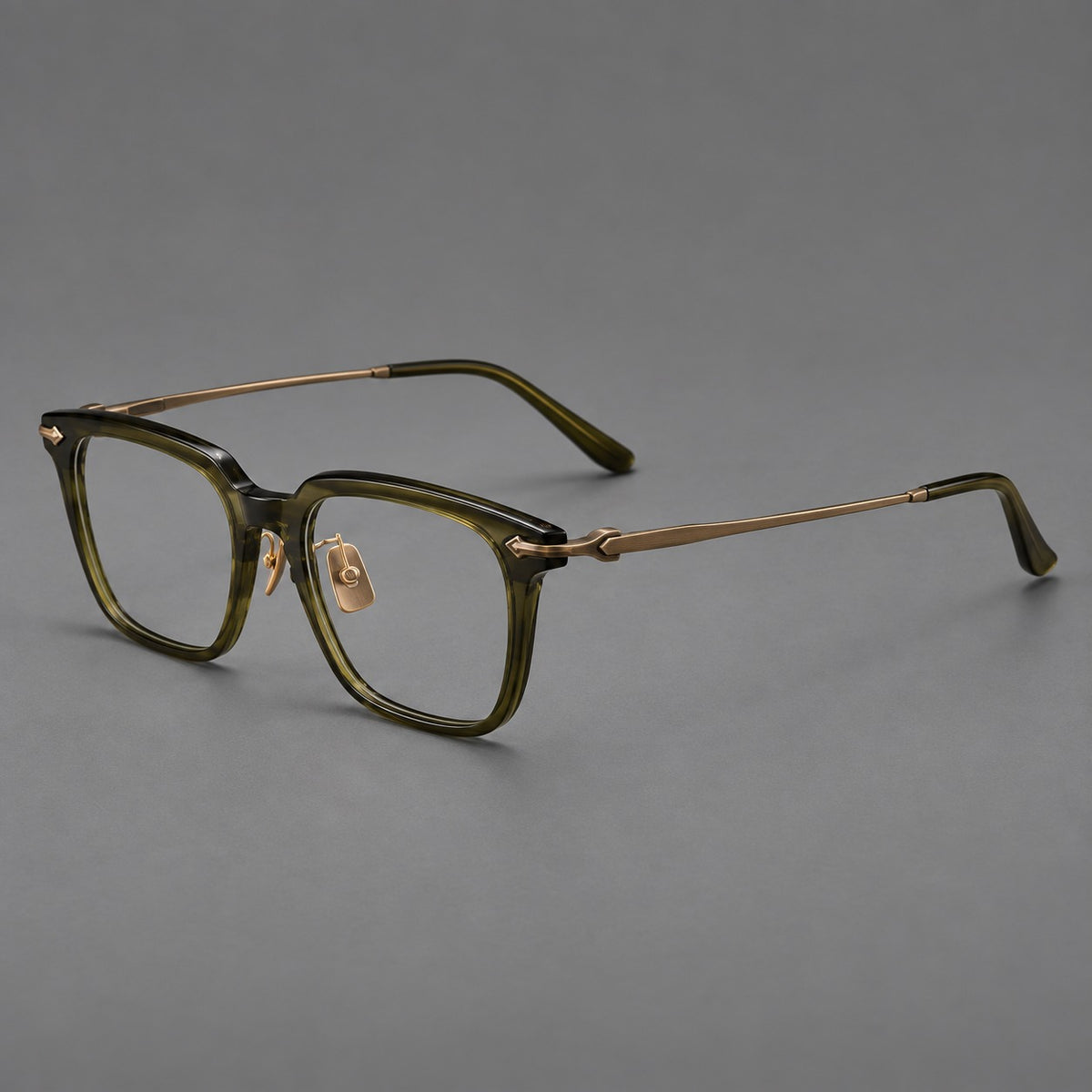 Bold acetate and titanium eyeglasses with rectangular rims and sculpted arrow accents — Army Green / Antique Bronze — Main view [CINILY-JD2026-8023-C5]