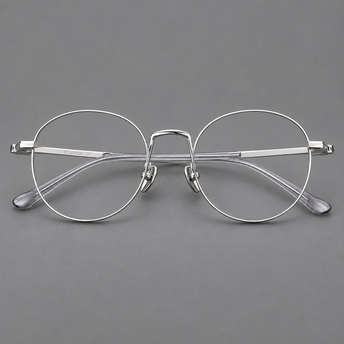 Retro round titanium glasses with a raised bridge and smooth corner shoulders — Silver — Front view [CINILY-JD2026-88006-C4]
