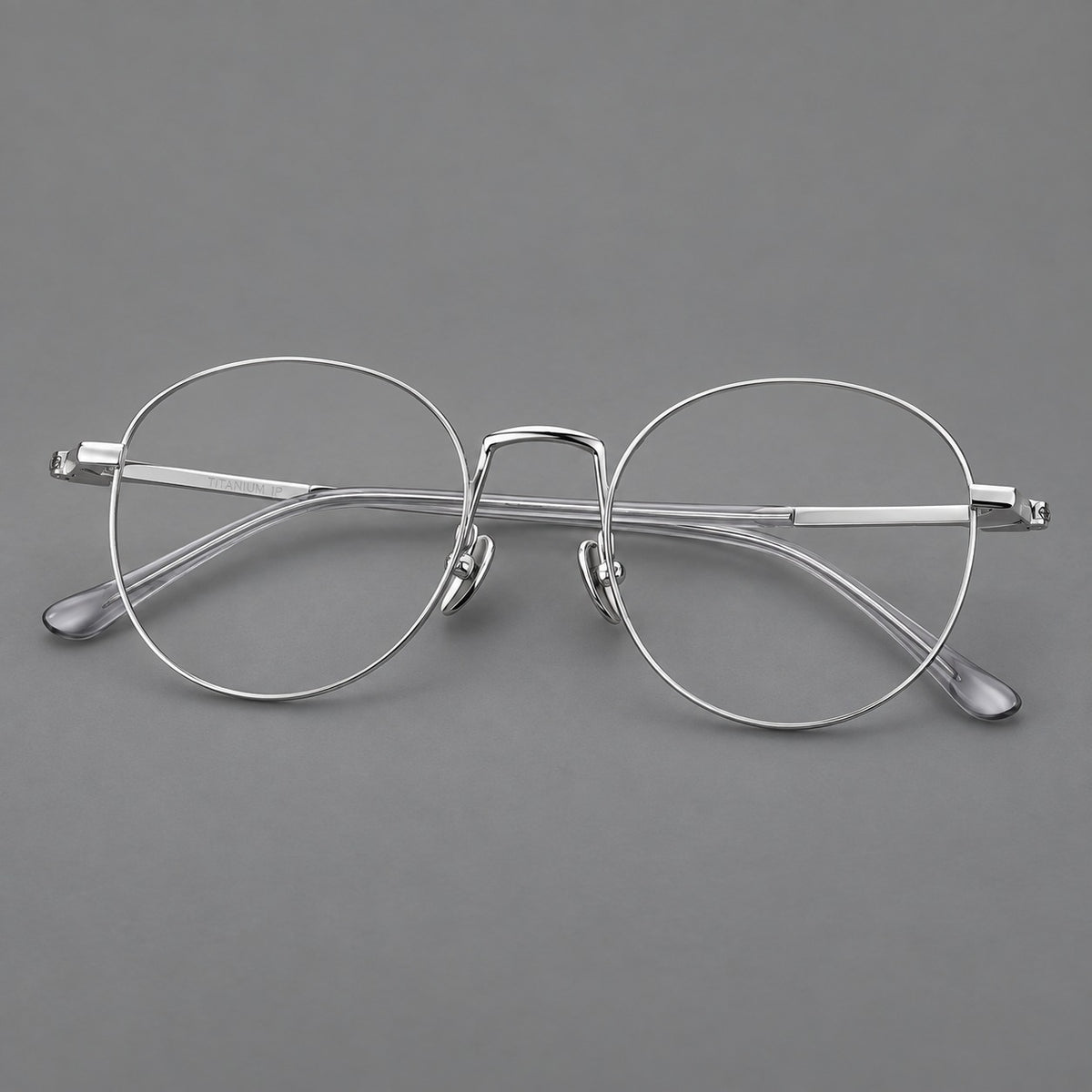 Retro round titanium glasses with a raised bridge and smooth corner shoulders — Silver — Main view [CINILY-JD2026-88006-C4]