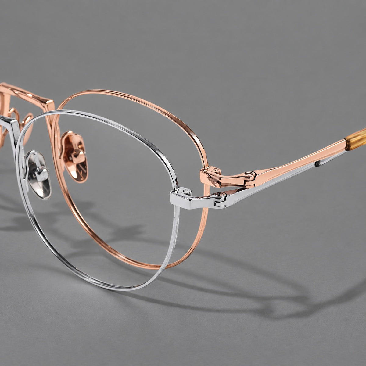 Retro round titanium glasses with a raised bridge and smooth corner shoulders — 88006 — Frame details [JD2026-88006]