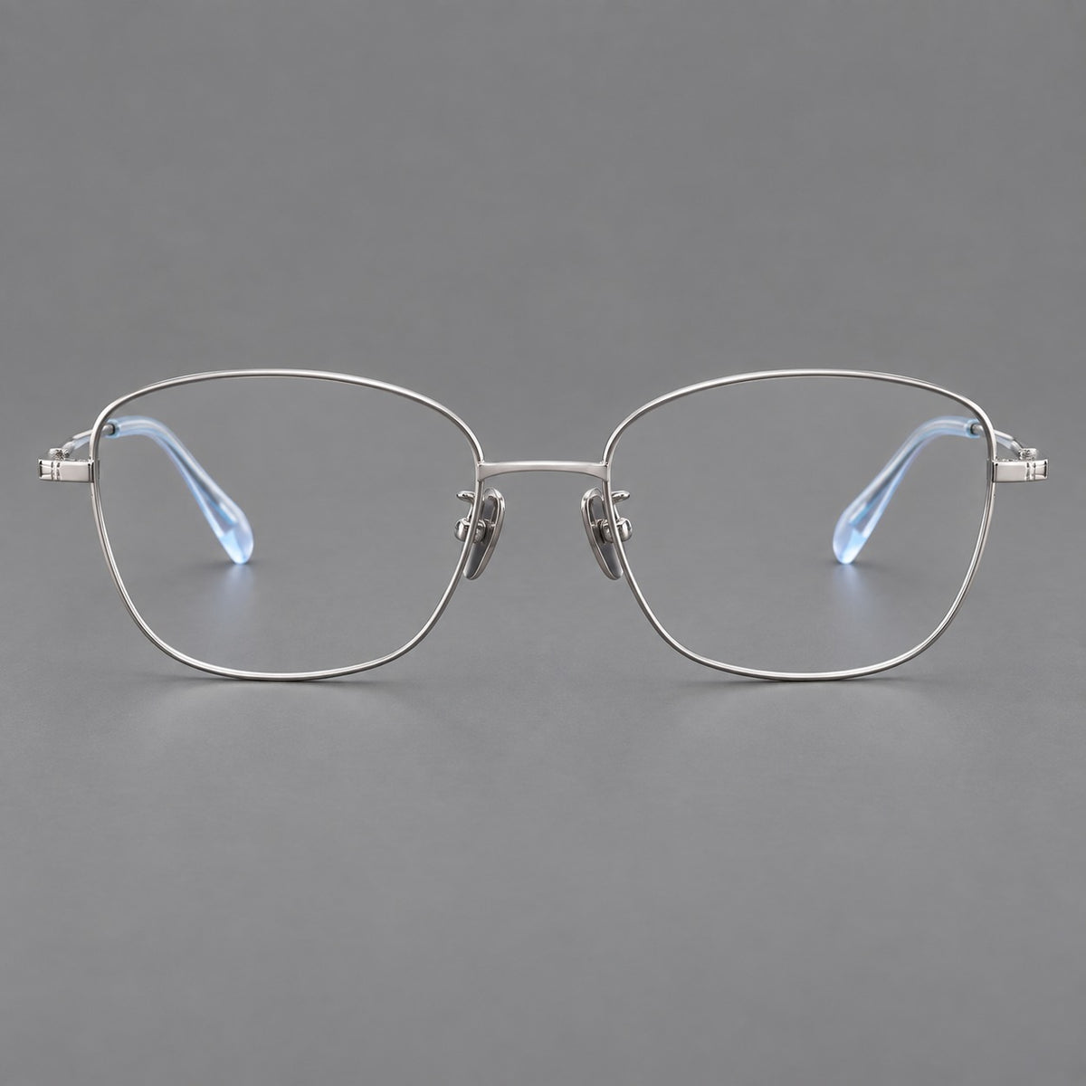 Soft square titanium glasses with angled upper corners and decorated hinges — Silver — Front view [CINILY-JD2026-88008-C4]