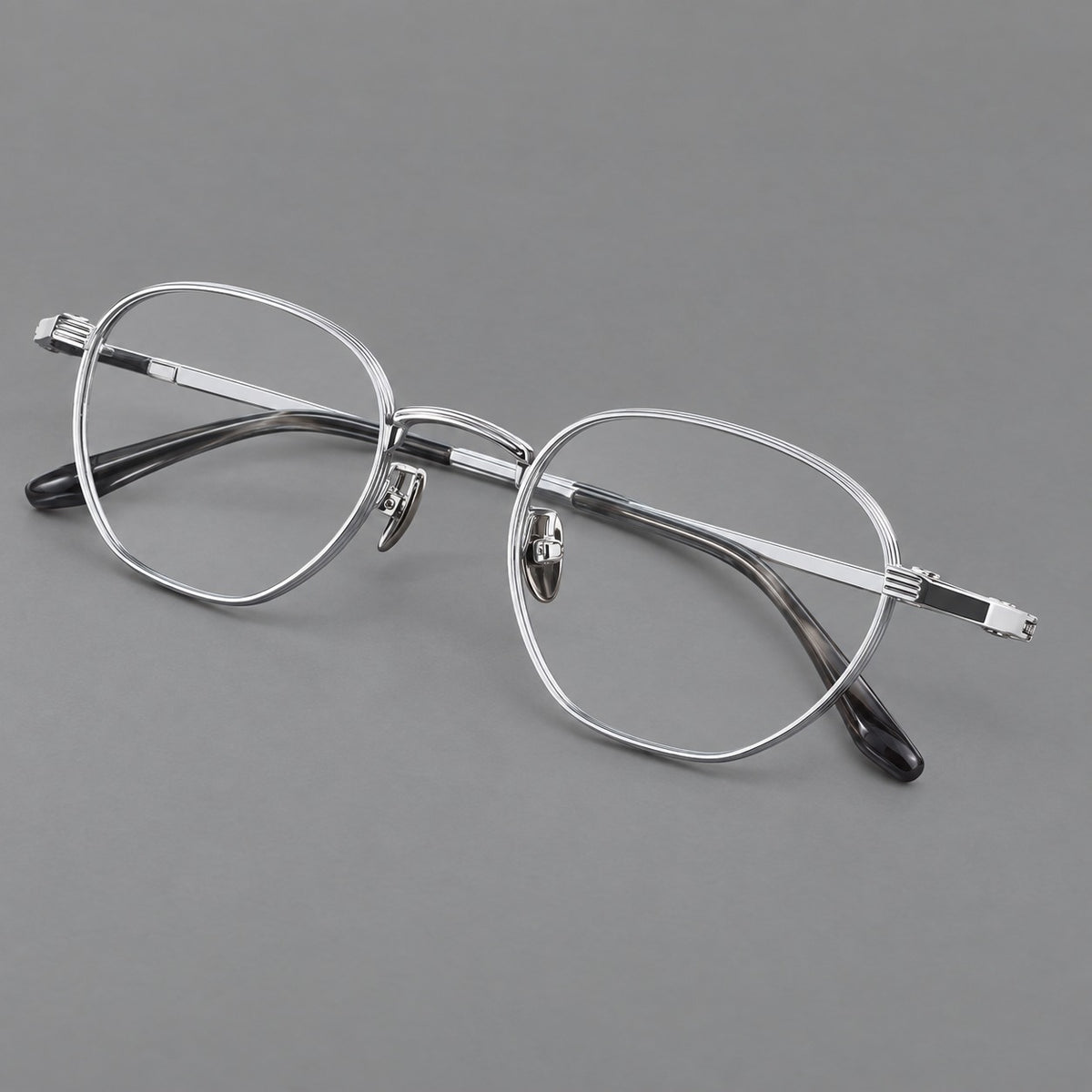 Retro panto titanium glasses with a curved bridge and fine parallel rim grooves — Black and Silver — Main view [CINILY-JD2026-88013-C2]