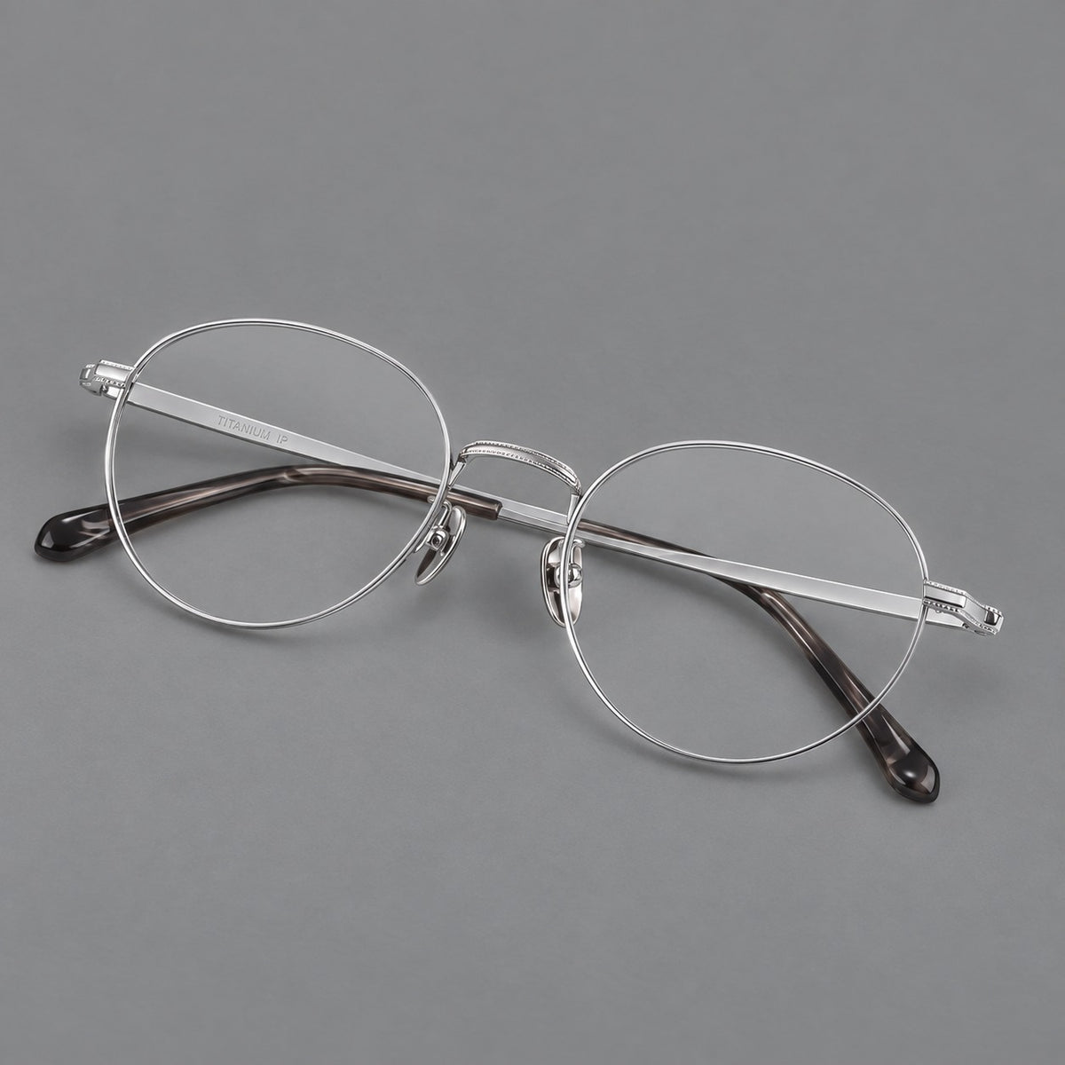 Rounded panto titanium glasses with a raised bridge and dotted temple accents — Silver — Main view [CINILY-JD2026-88017-C4]