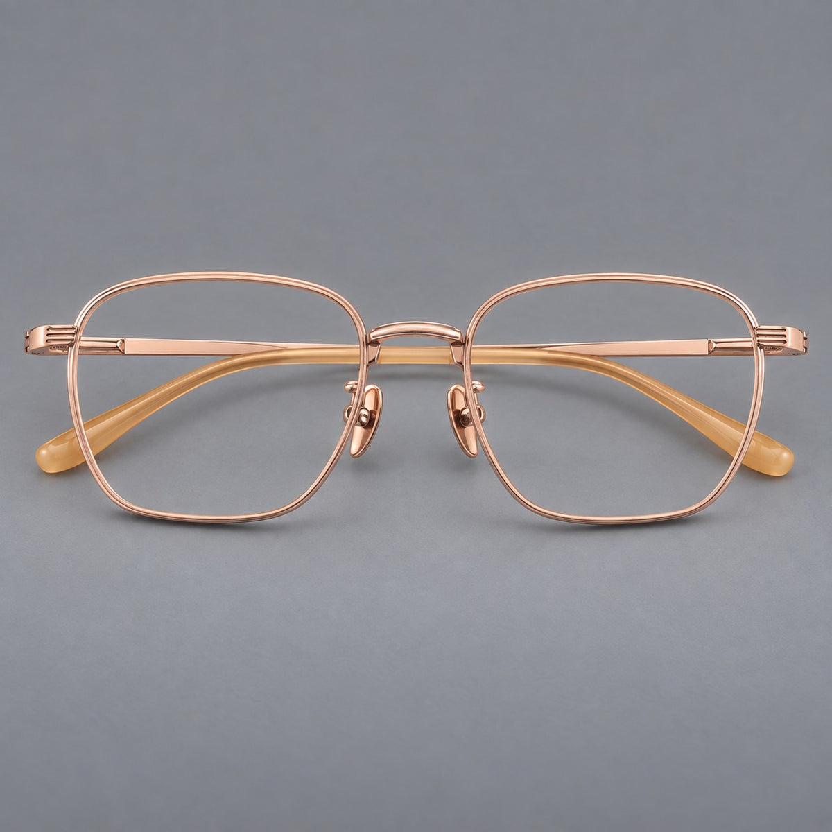 Deep square titanium glasses with a flatter brow and grooved outer shoulders — Rose Gold — Front view [CINILY-JD2026-88020-C5]