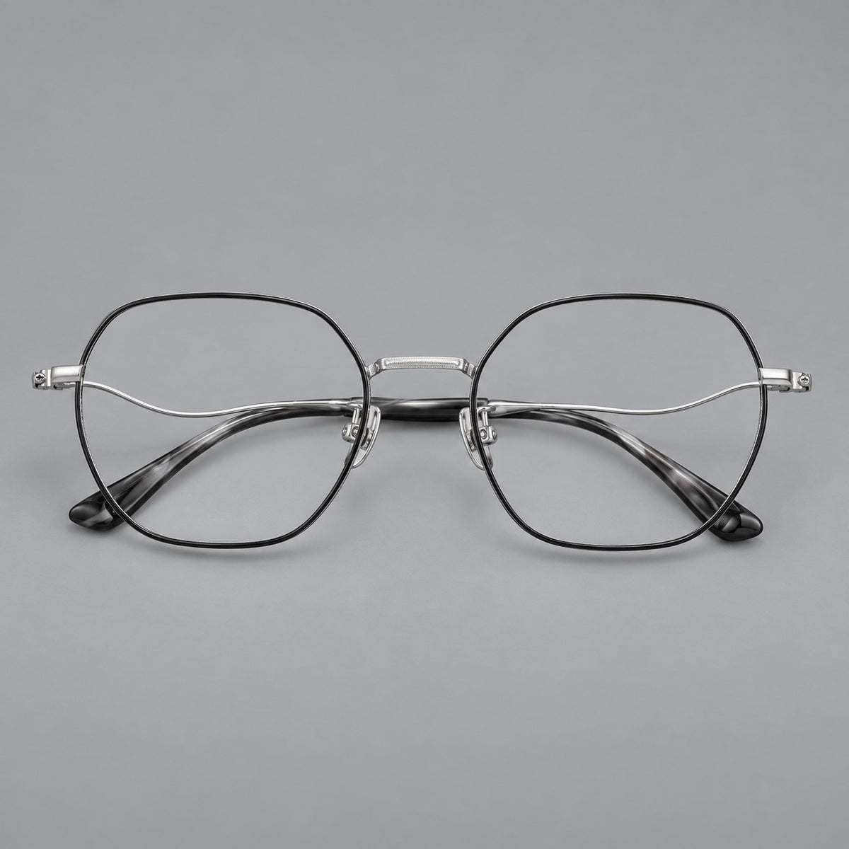 Geometric titanium glasses with engraved rim edges and curved temple joins — Black and Silver — Front view [CINILY-JD2026-88042-C2]