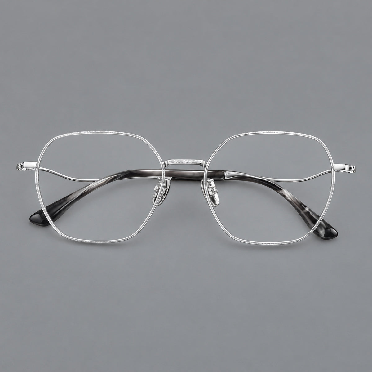 Geometric titanium glasses with engraved rim edges and curved temple joins — Silver — Front view [CINILY-JD2026-88042-C4]