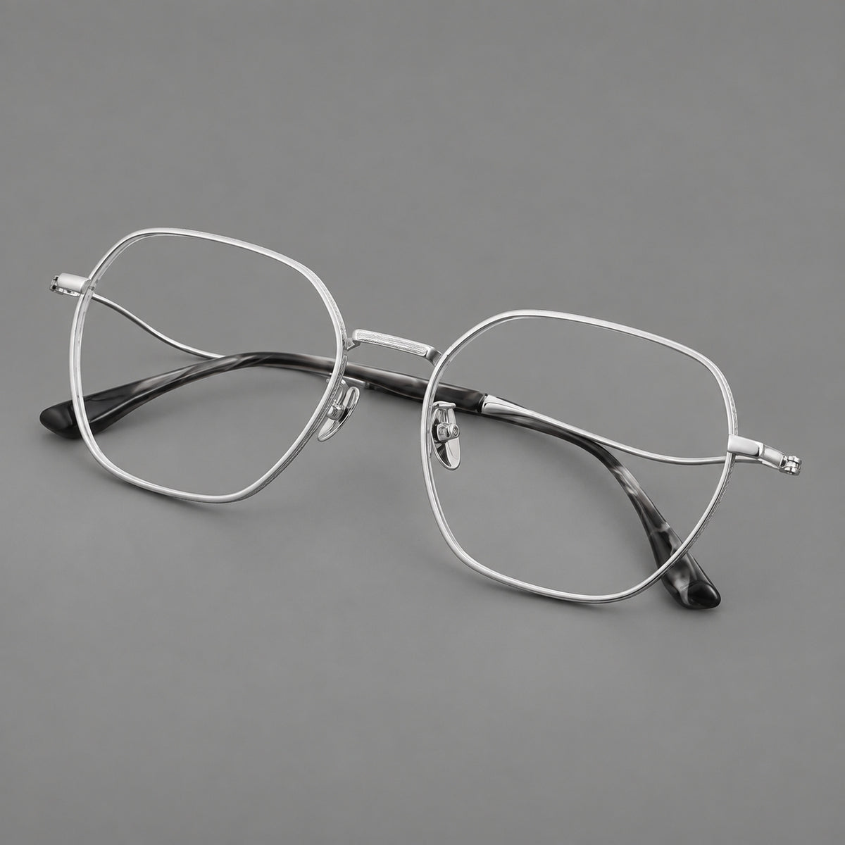 Geometric titanium glasses with engraved rim edges and curved temple joins — Silver — Main view [CINILY-JD2026-88042-C4]