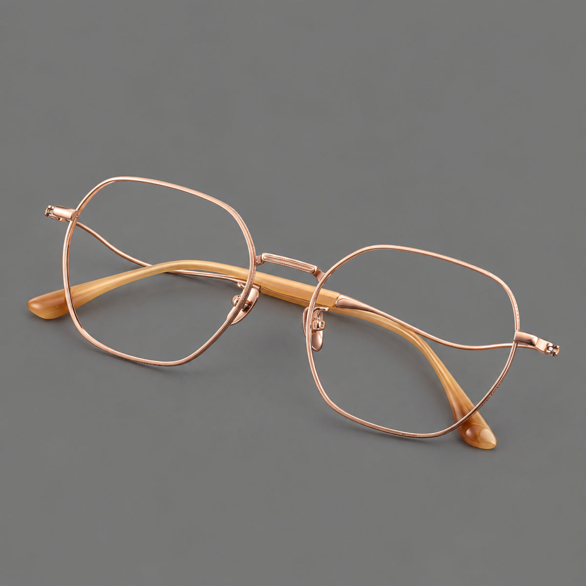 Geometric titanium glasses with engraved rim edges and curved temple joins — Rose Gold — Main view [CINILY-JD2026-88042-C5]