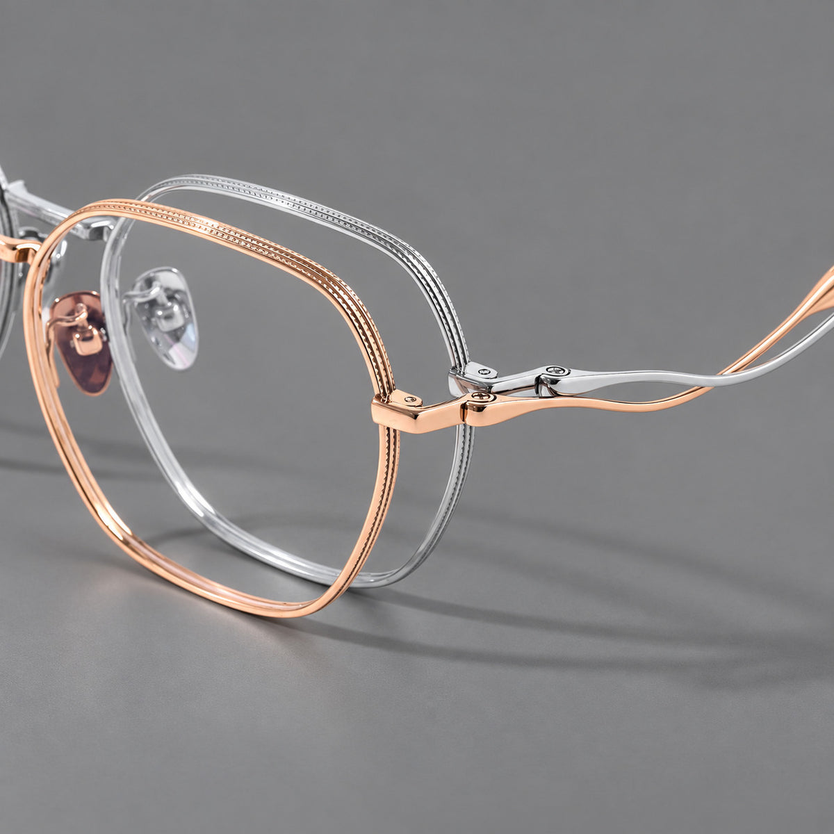 Geometric titanium glasses with engraved rim edges and curved temple joins — 88042 — Frame details [JD2026-88042]