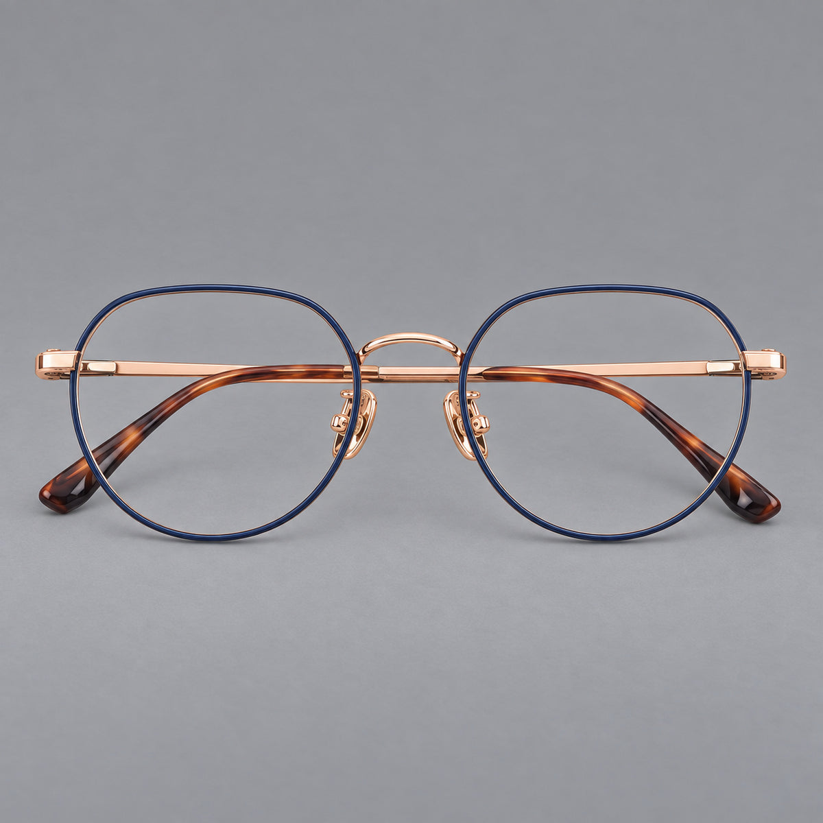 Classic panto titanium glasses with a curved bridge and slim straight temples — Blue and Rose Gold — Front view [CINILY-JD2026-88043-C3]