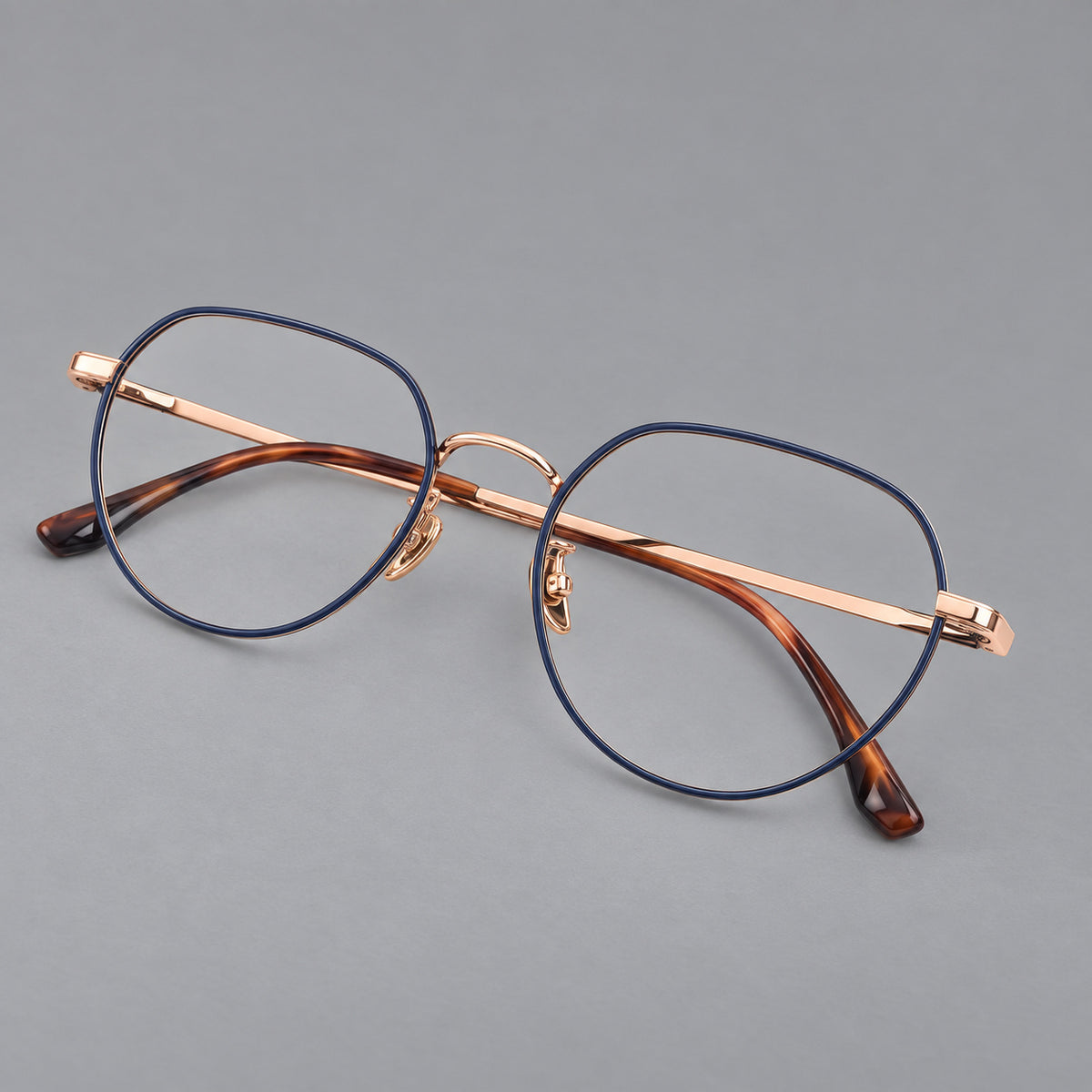 Classic panto titanium glasses with a curved bridge and slim straight temples — Blue and Rose Gold — Main view [CINILY-JD2026-88043-C3]