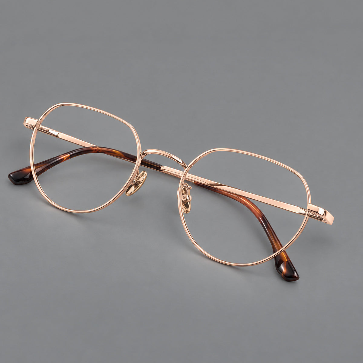 Classic panto titanium glasses with a curved bridge and slim straight temples — Rose Gold — Main view [CINILY-JD2026-88043-C5]