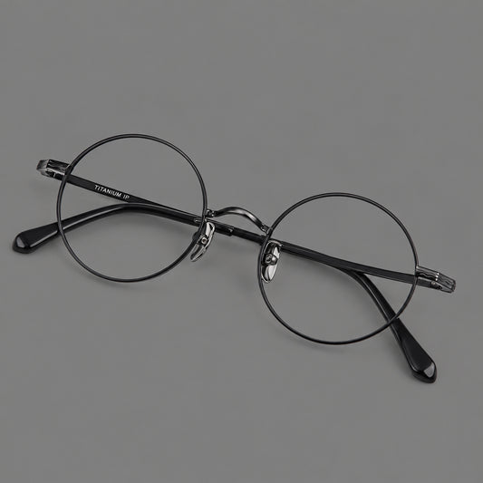 Compact circular titanium glasses with a curved bridge and wavy engraved temples — Black — Main view [CINILY-JD2026-88047-C1]