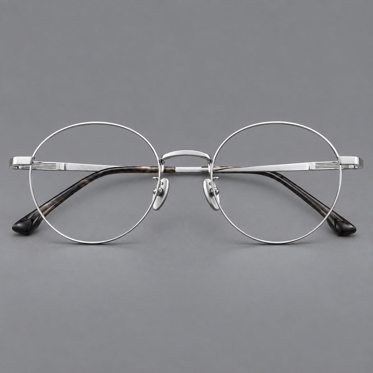 Classic circular titanium glasses with a raised bridge and lined temple accents — Silver — Front view [CINILY-JD2026-88049-C4]