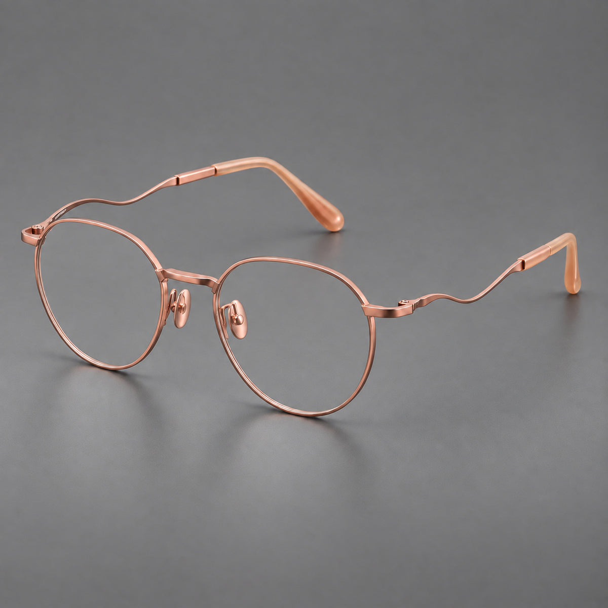 Rounded titanium glasses with a short bridge and distinctive wavy metal temples — Rose Gold — Main view [CINILY-JD2026-88050-C5]