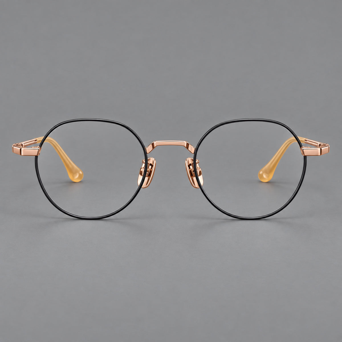 Small panto titanium glasses with an angular bridge and recessed temple details — Black and Rose Gold — Front view [CINILY-JD2026-88058-C2]