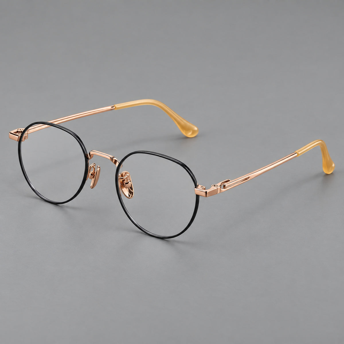 Small panto titanium glasses with an angular bridge and recessed temple details — Black and Rose Gold — Main view [CINILY-JD2026-88058-C2]