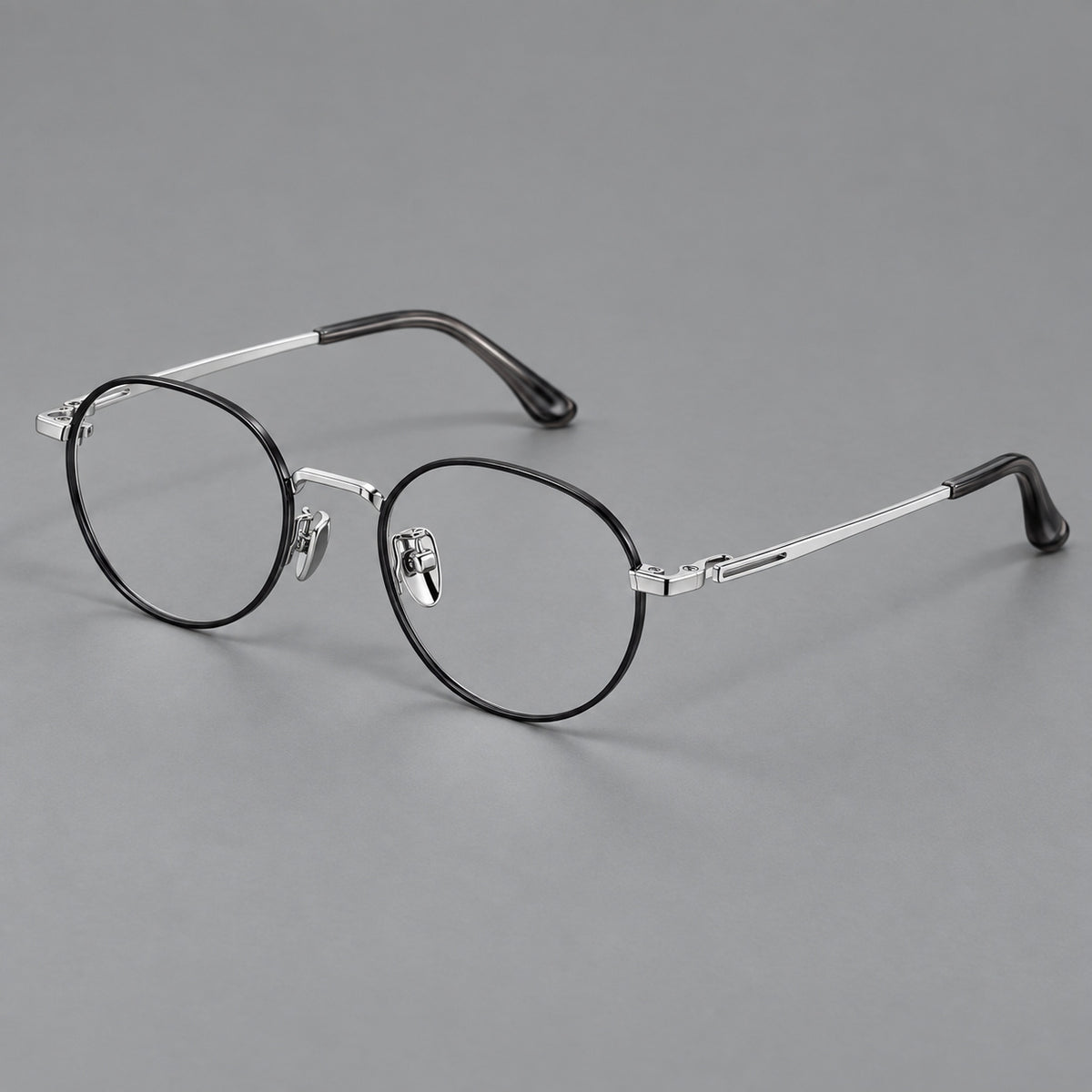 Small panto titanium glasses with an angular bridge and recessed temple details — Black and Silver — Main view [CINILY-JD2026-88058-C3]