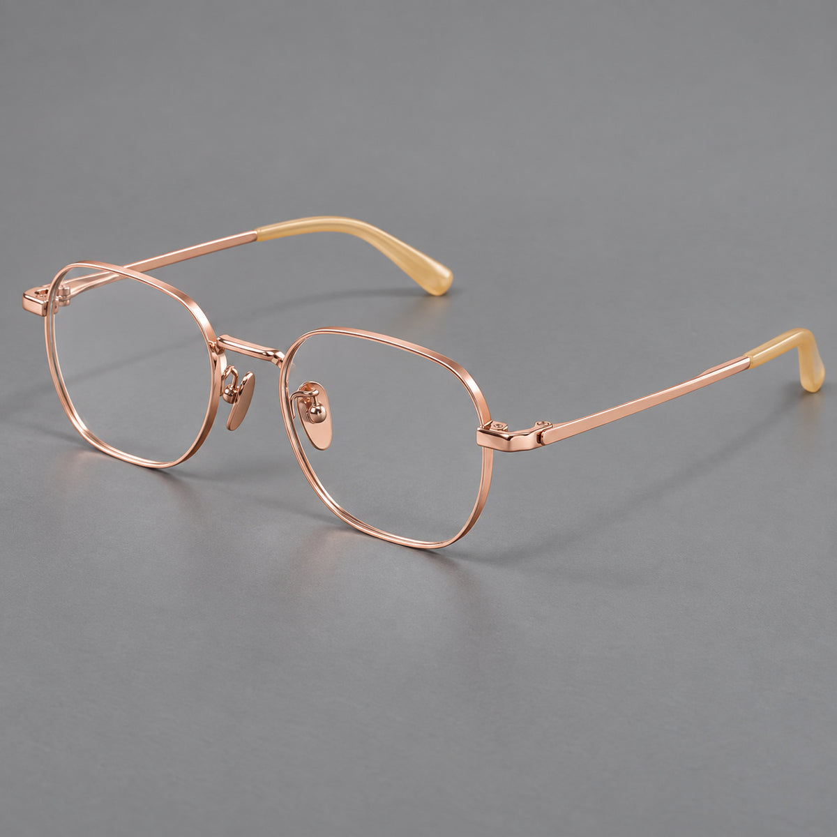 Rounded panto titanium glasses with an angular bridge and broad flat temples — Rose Gold — Main view [CINILY-JD2026-88060-C5]