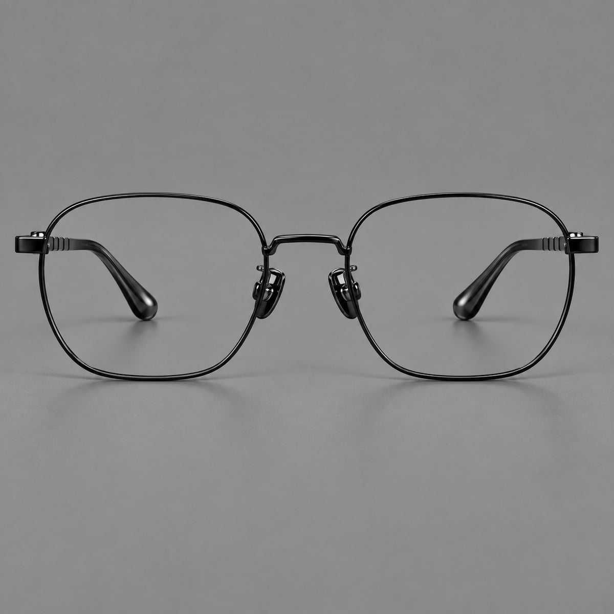 Soft square titanium glasses with a raised bridge and engraved temple bands — Black — Front view [CINILY-JD2026-88061-C1]