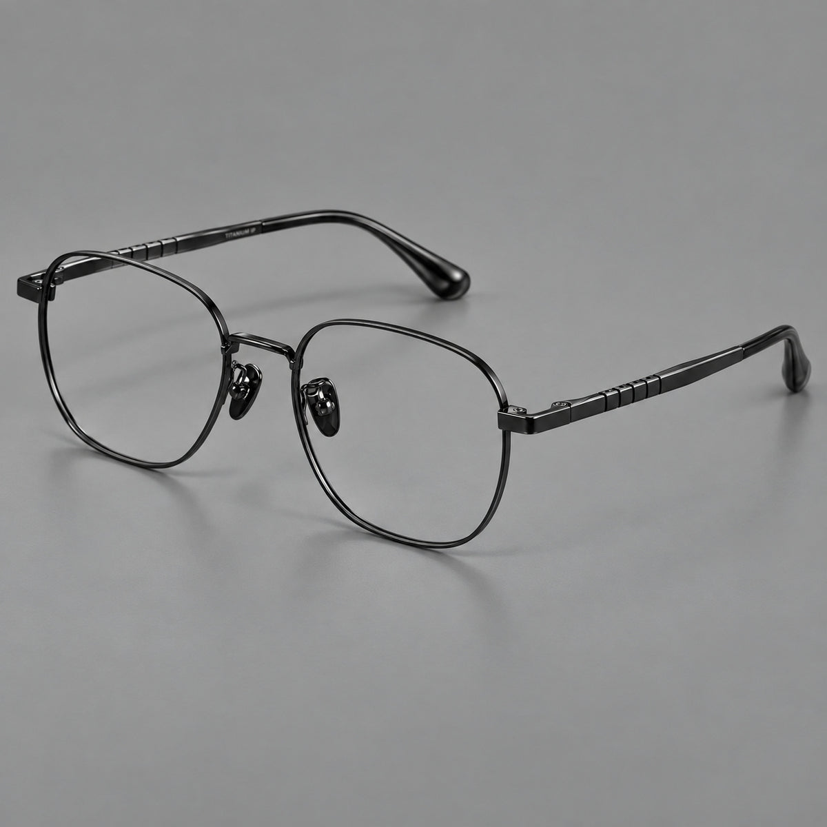 Soft square titanium glasses with a raised bridge and engraved temple bands — Black — Main view [CINILY-JD2026-88061-C1]
