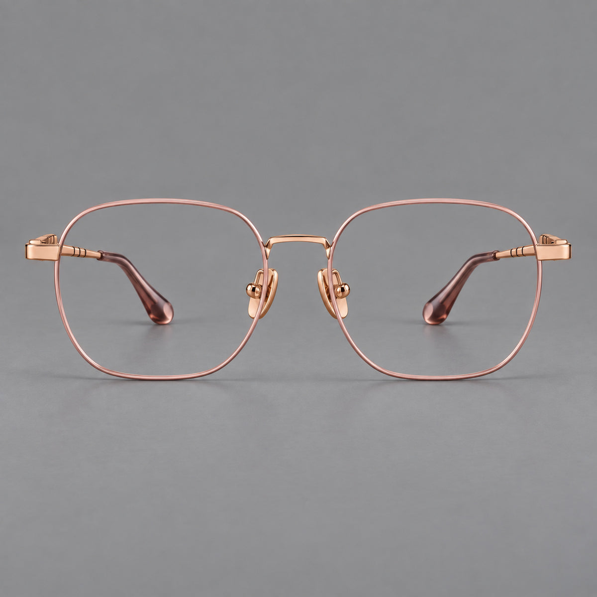 Soft square titanium glasses with a raised bridge and engraved temple bands — Pink and Rose Gold — Front view [CINILY-JD2026-88061-C3]