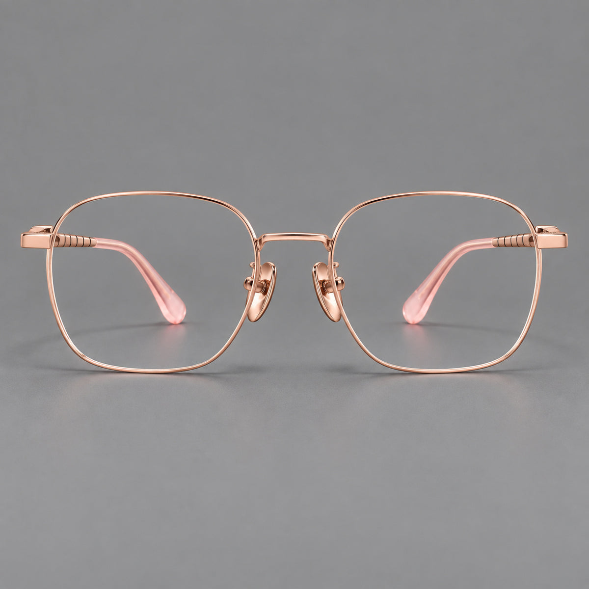 Soft square titanium glasses with a raised bridge and engraved temple bands — Rose Gold — Front view [CINILY-JD2026-88061-C5]