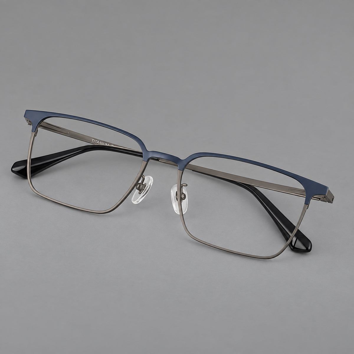 Bold rectangular titanium glasses with strong upper corners and flat metal temples — Blue and Gunmetal — Main view [CINILY-JD2026-88067-C2]