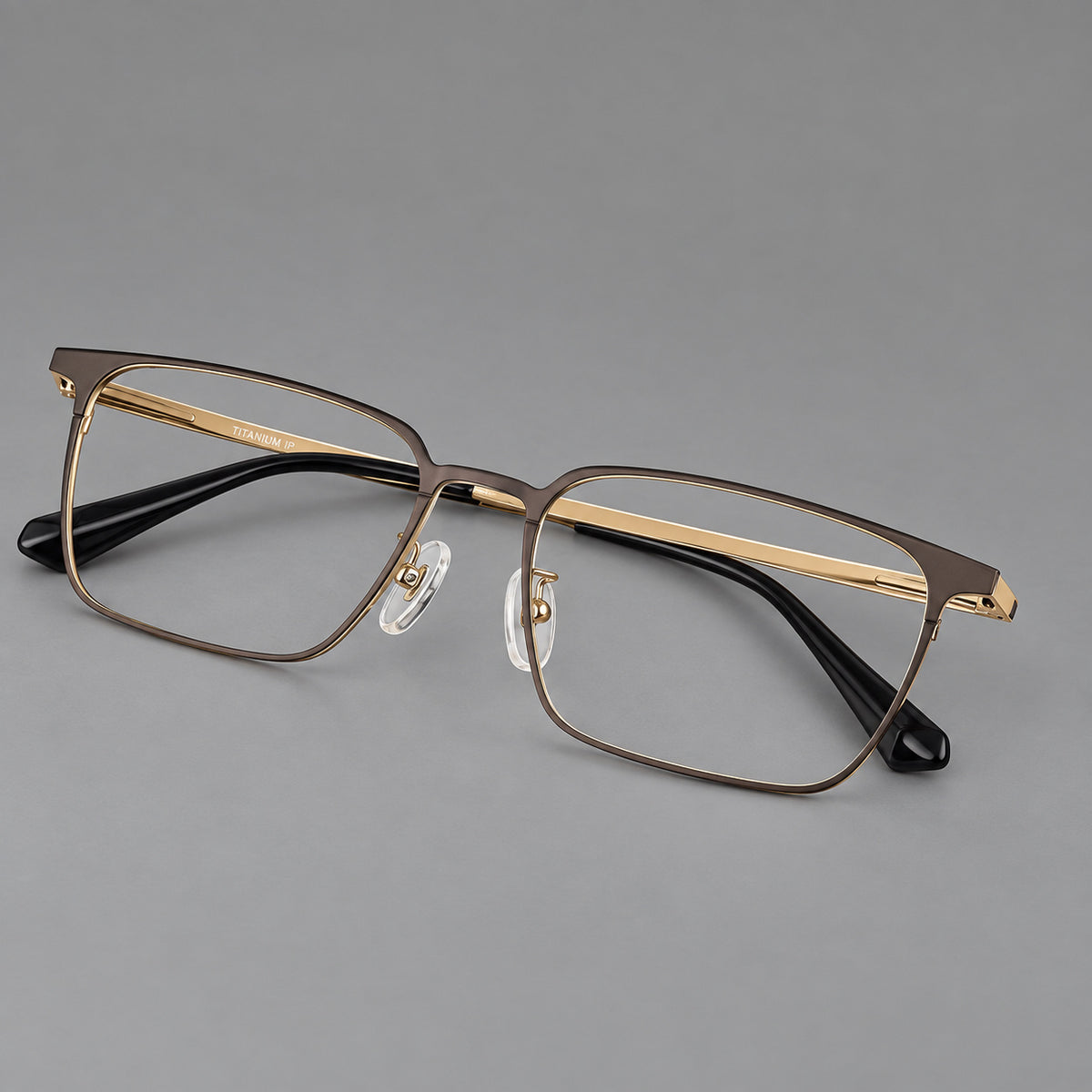 Bold rectangular titanium glasses with strong upper corners and flat metal temples — Gold — Main view [CINILY-JD2026-88067-C3]