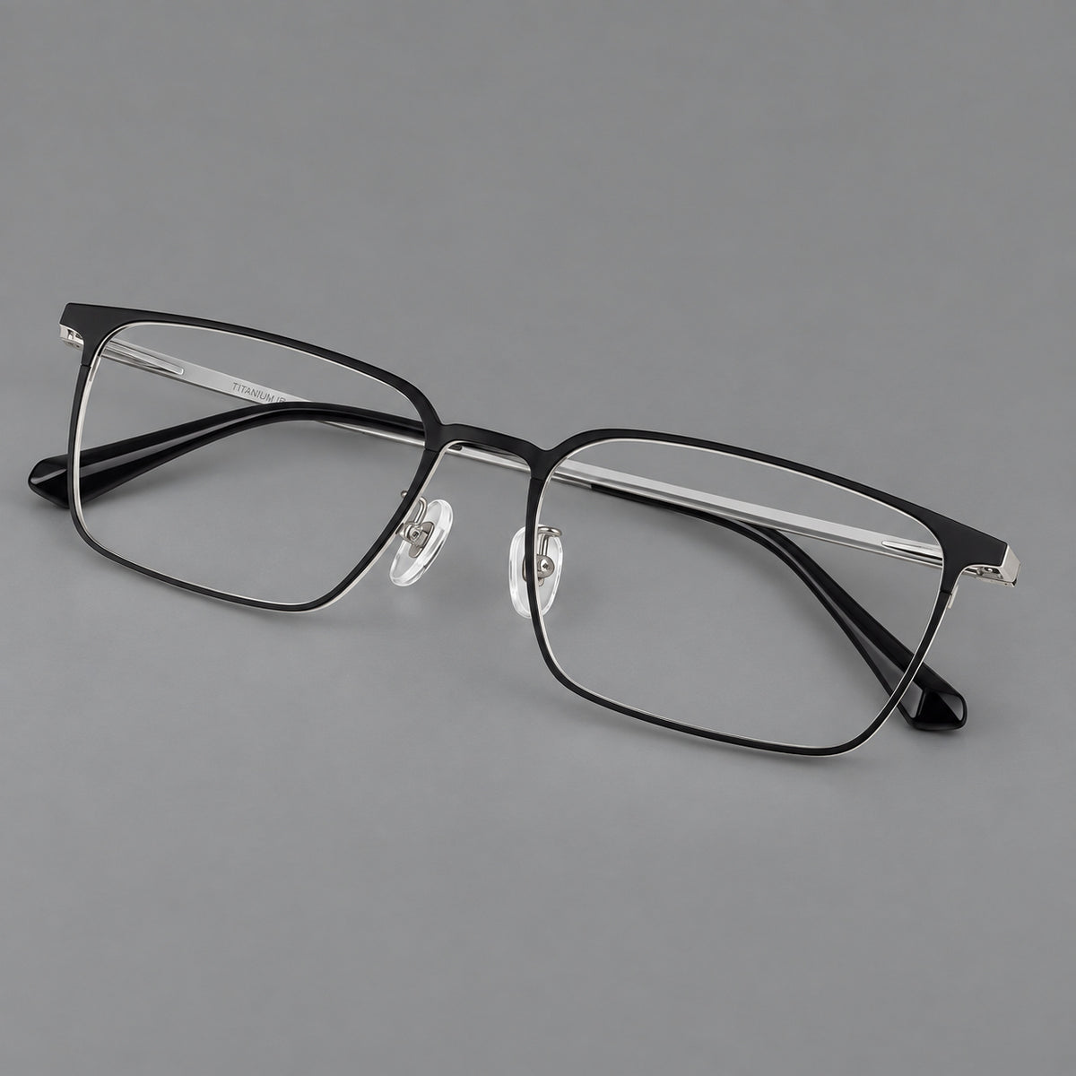 Bold rectangular titanium glasses with strong upper corners and flat metal temples — Black and Silver — Main view [CINILY-JD2026-88067-C4]